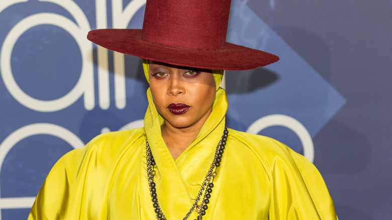 Erykah Badu in yellow outfit