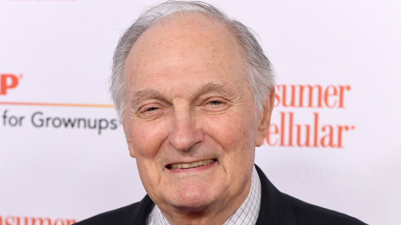 Alan Alda smiling at event