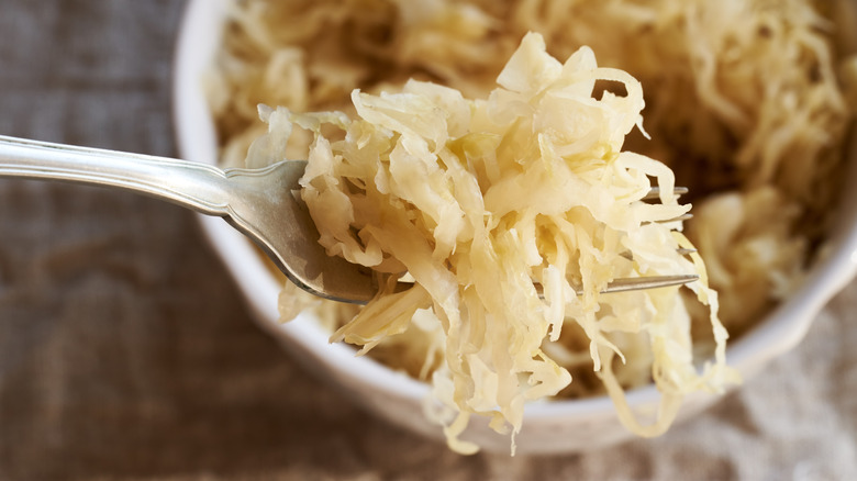 sauerkraut in bowl and on fork