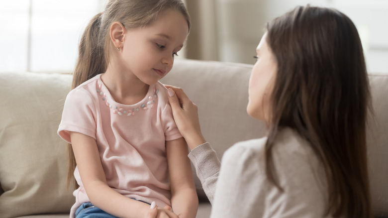 young stressed girl and mother 