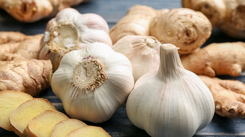 ginger and fresh garlic on wood 