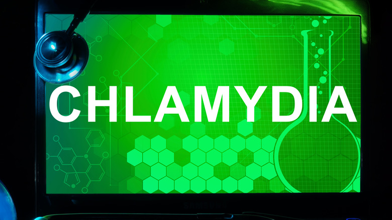 word chlamydia on green background 