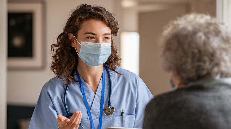 Doctor giving explanation to patient