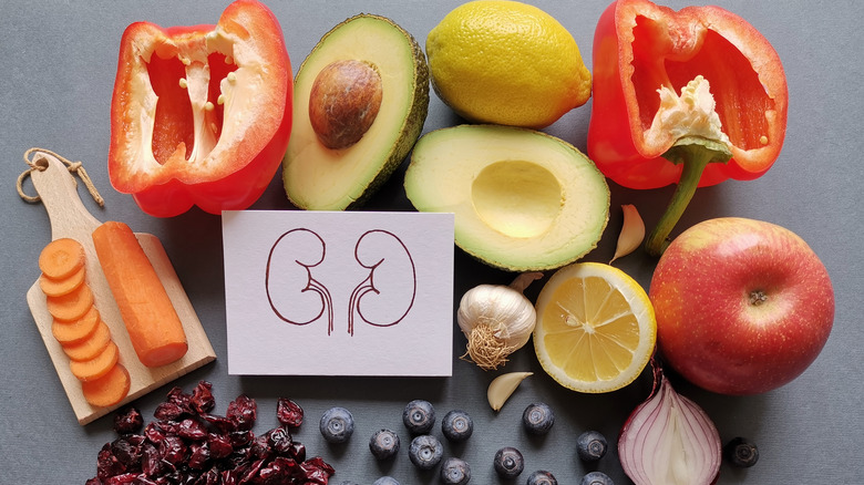 Kidney image surrounded by healthy food