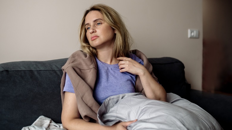 Woman sitting on the couch