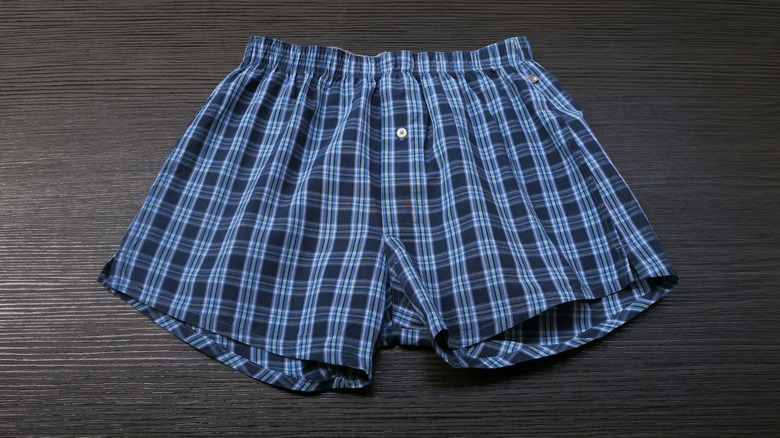 A pair of blue plaid boxer shorts