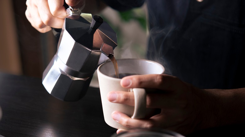 woman drinking coffee