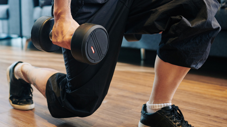 Man working out with a dumbbell