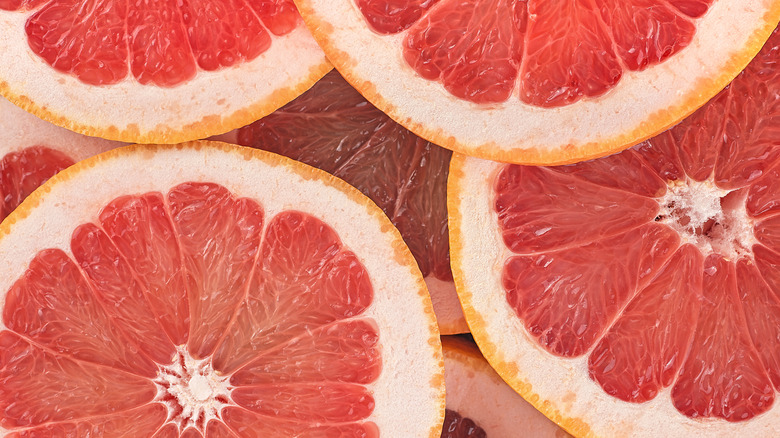 closeup of halved grapefruits