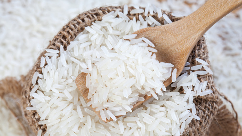 white rice on a wooden spoon