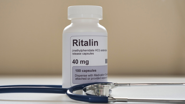 Ritalin bottle behind stethoscope