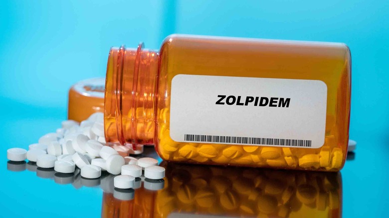 Pills spilling from Zolpidem bottle