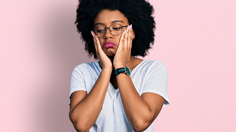 Woman looking incredibly tired