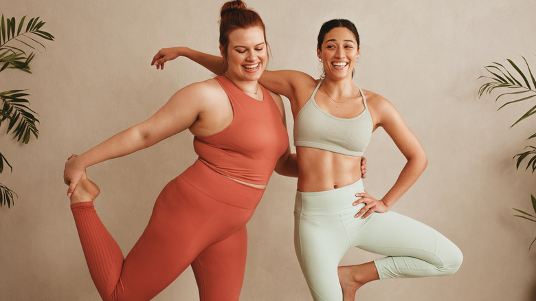 two women exercising together