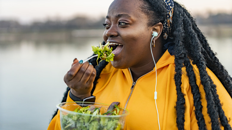 woman eating a healthy salad