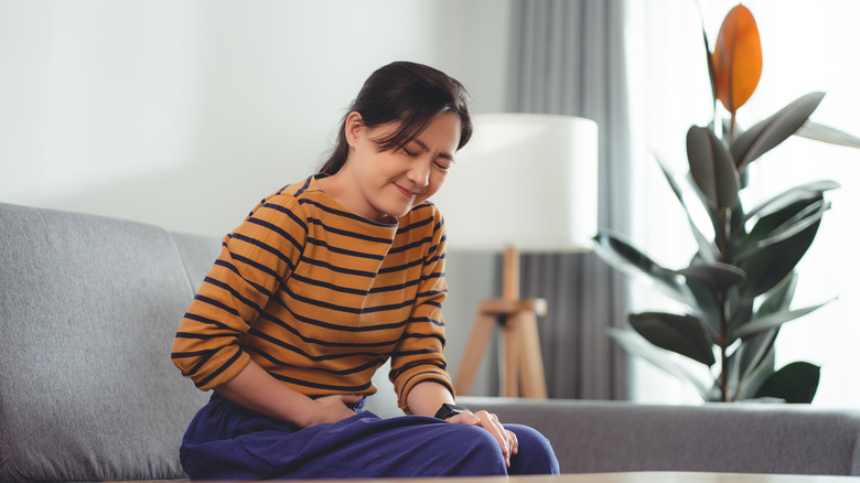 Woman with stomach pain