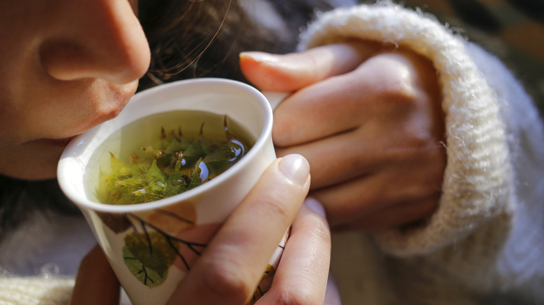 Woman drinking herbal tea