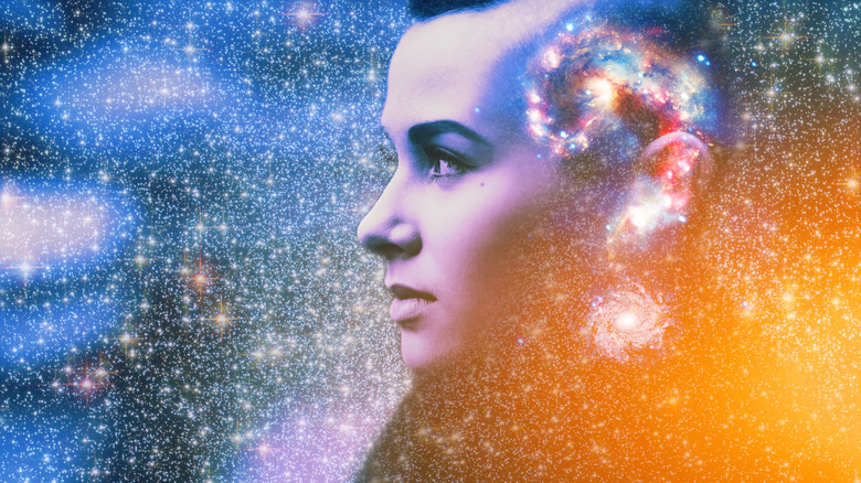 woman's head with cosmic background