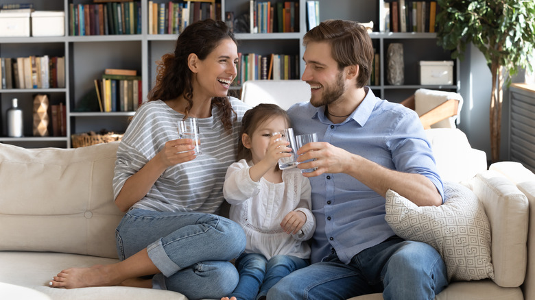 family drinking water