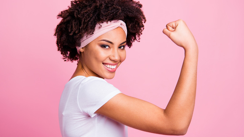 A woman showing off arms