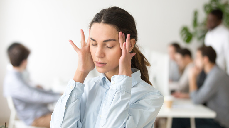 woman trying to concentrate