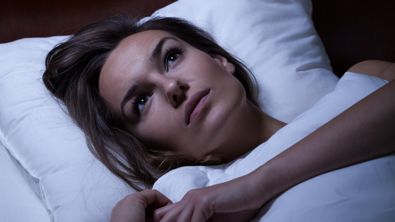 Woman lying awake at night