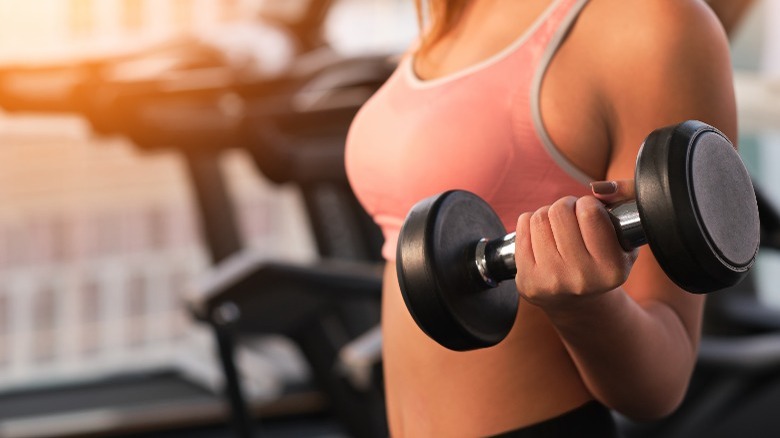 Woman exercising with weights 