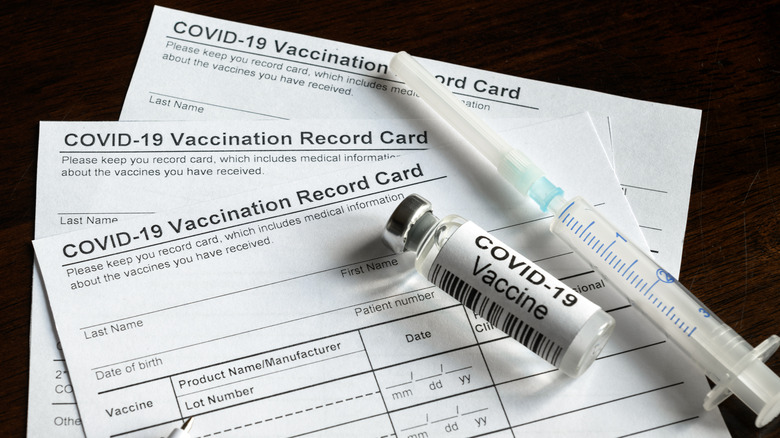 COVID-19 vial and vaccination card