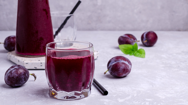 A glass of fresh prune juice