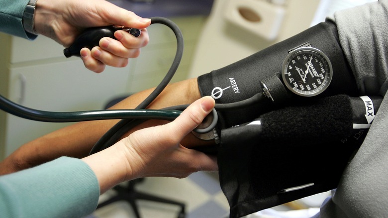 Patient receiving blood pressure reading