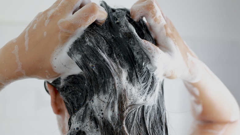 Person washing their hair