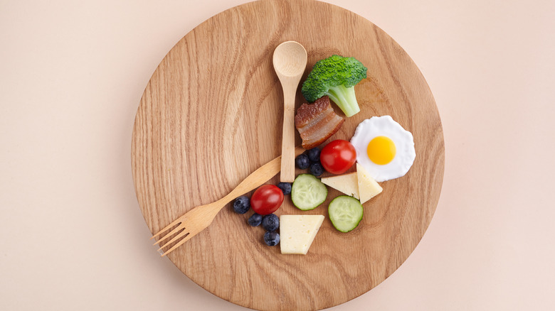 eating window concept with plate of food 