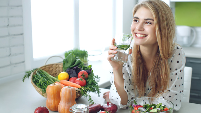 Woman with food and water