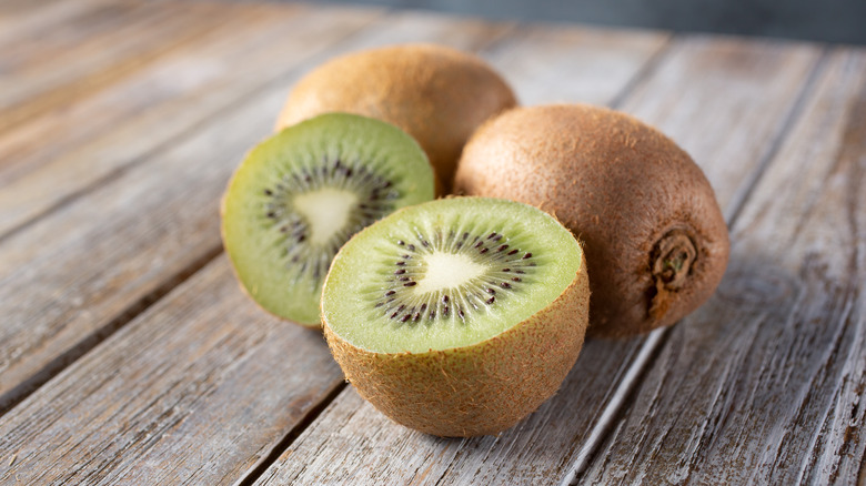 kiwis on a wooden table