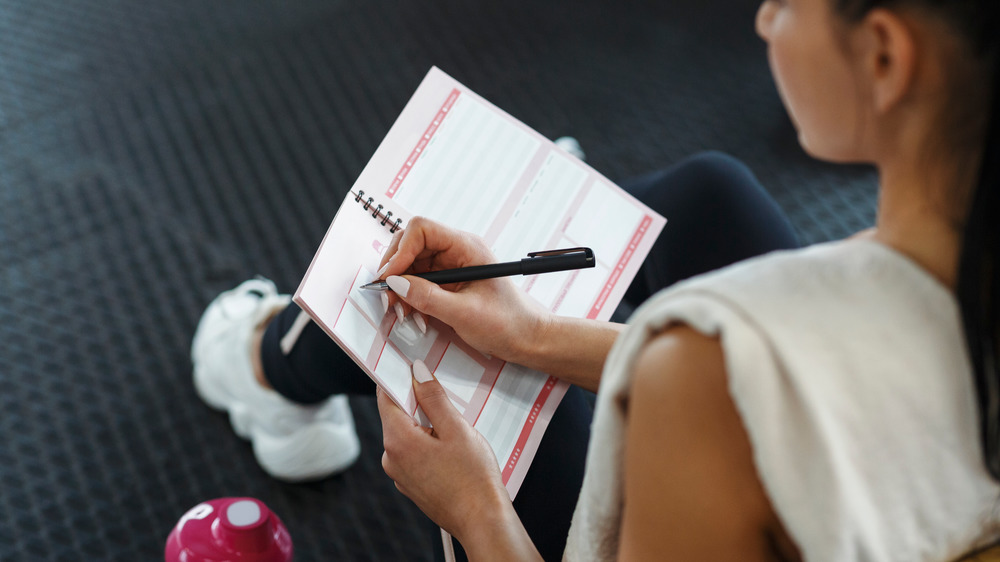 woman tracking exercise