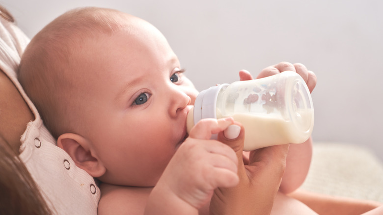 Baby drinking from a bottle