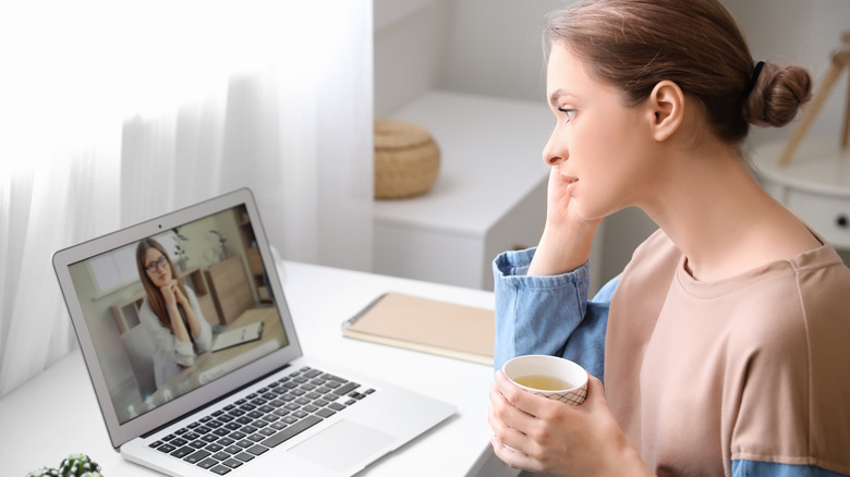 Woman doing online therapy