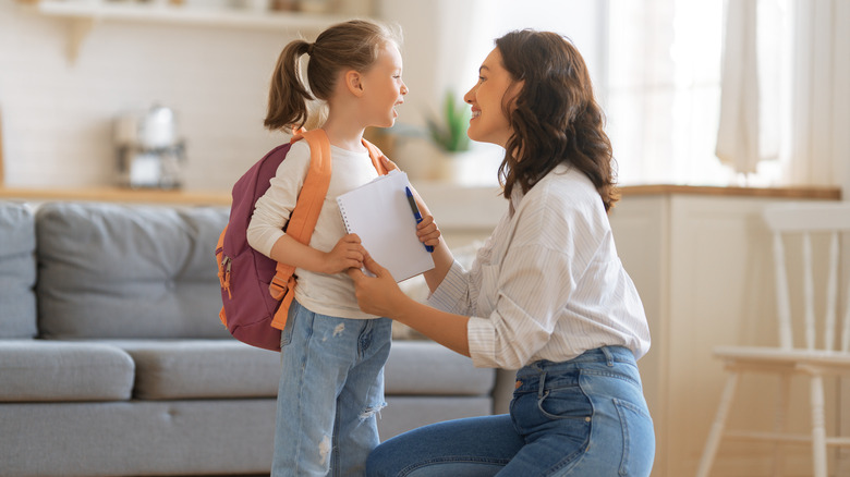 Mom and child with backpack