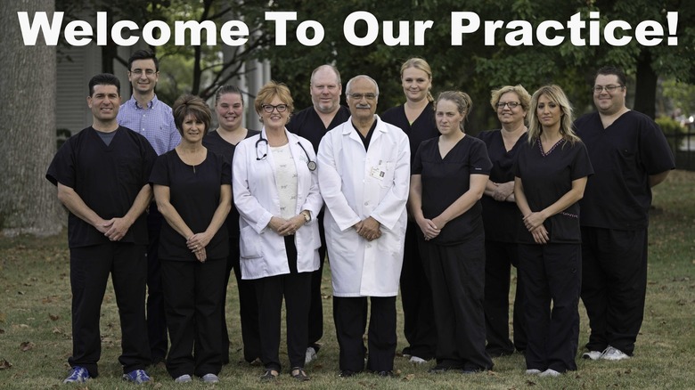 Dr. Julian Ungar-Sargon with the doctors and nurses from his pain management clinic