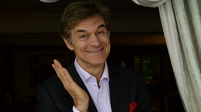 Dr. Oz shrugging and smiling