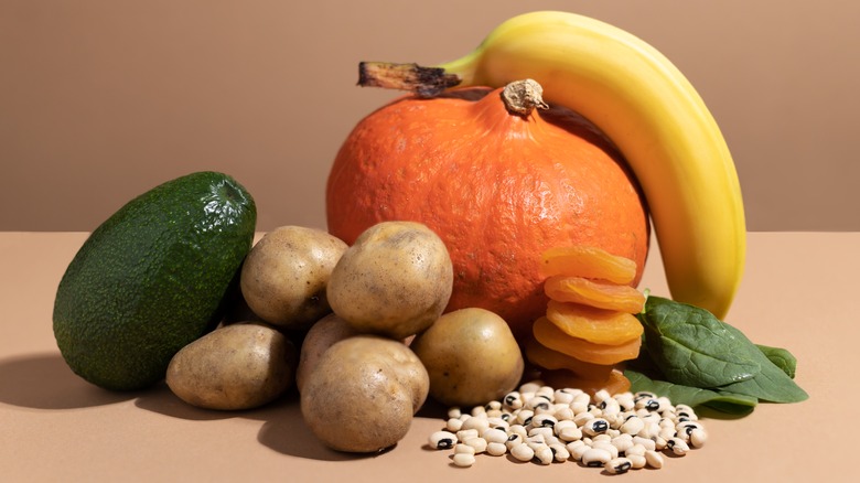 beans, pumpkin, banana and other high potassium foods on a table