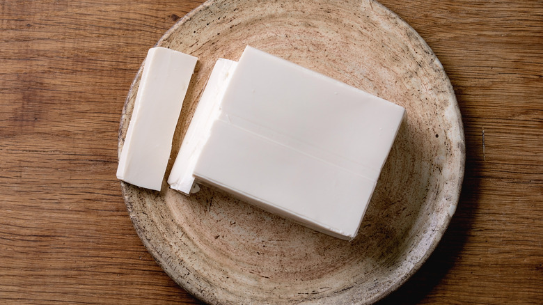 Silk tofu on a ceramic plate