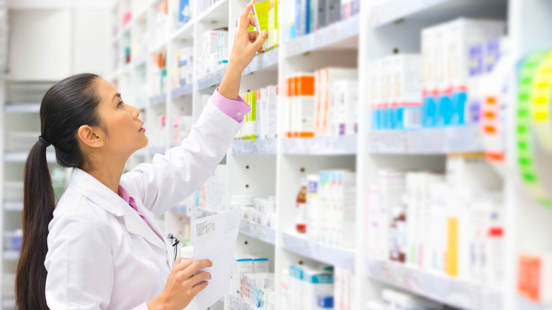 pharmacist choosing medication