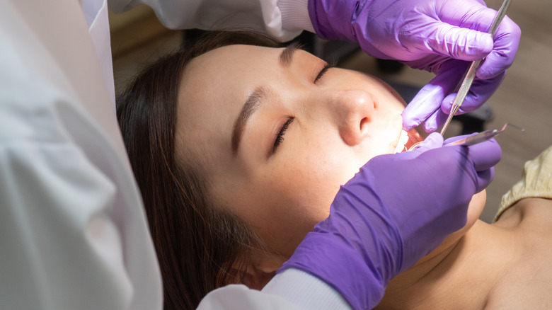 Dentist working on fillings for cavities