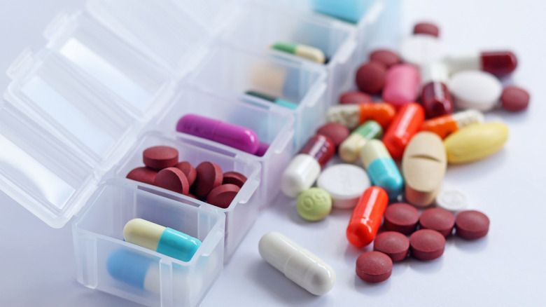 over-the-counter and prescription drugs with container