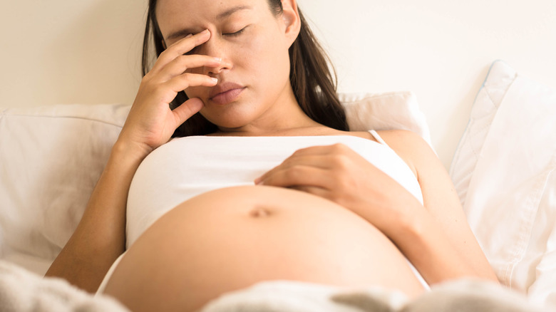 Pregnant woman with morning sickness.