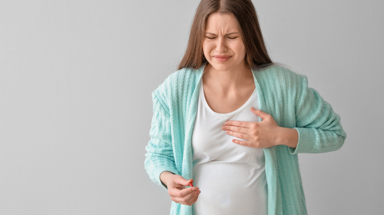 Pregnant woman with heartburn.