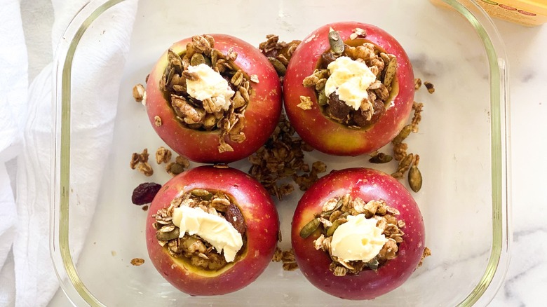 stuffed apples in baking dish