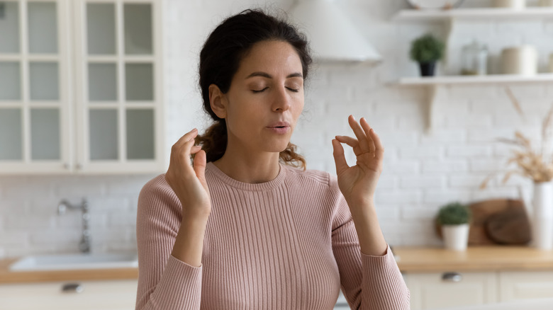 woman practicing deep breathing