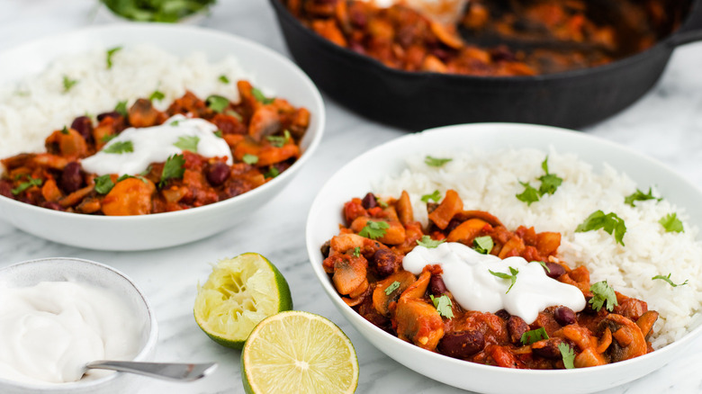 Mushroom chili with rice, cilantro, and limes